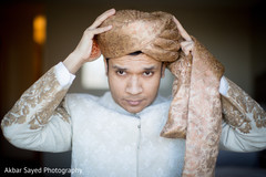 Rajah putting his turban on. Rajah putting his turban on.