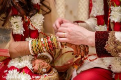 Indian bride and groom during the rituals Indian bride and groom during the rituals