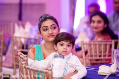 Indian guest with kid at the reception Indian guest with kid at the reception