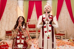 Indian bride and groom having a spiritual moment Indian bride and groom having a spiritual moment