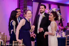 Guests having a nice time with newlyweds Guests having a nice time with newlyweds