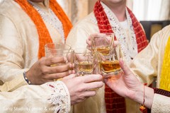 Indian groomsmen toasting for the newlyweds Indian groomsmen toasting for the newlyweds
