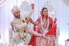 Joyful Indian couple at ceremony rituals. Joyful Indian couple at ceremony rituals.