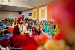 Gorgeous Indian bride and groom during their ceremony celebration. Gorgeous Indian bride and groom during their ceremony celebration.