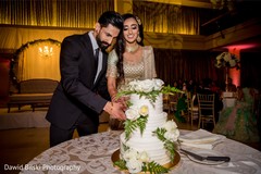 Indian couple cutting cake moment. Indian couple cutting cake moment.
