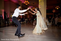 Indian lovebirds having their first dance. Indian lovebirds having their first dance.