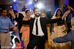 Adorable indian groom dancing capture. Adorable indian groom dancing capture.