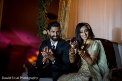 Joyful indian bride and groom at reception speech. Joyful indian bride and groom at reception speech.