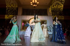 Gleeful indian bridal reception dance performance. Gleeful indian bridal reception dance performance.