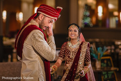 Emotional Indian couple's first look photo. Emotional Indian couple's first look photo.