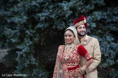 Indian bride and Raja posing for pictures Indian bride and Raja posing for pictures