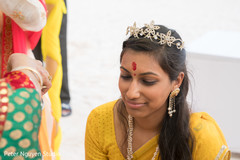 Indian bride at her pre-wedding ritual. Indian bride at her pre-wedding ritual.
