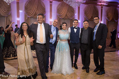 Indian bride posing with guests Indian bride posing with guests
