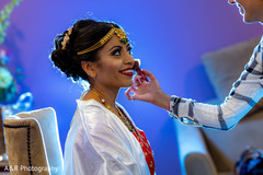 Beautiful Maharani being assisted by makeup artist Beautiful Maharani being assisted by makeup artist