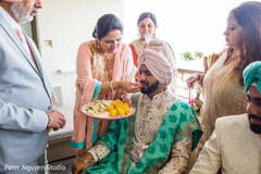 Indian groom eating when getting ready. Indian groom eating when getting ready.