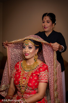 Indian bride getting ready for the ceremony Indian bride getting ready for the ceremony
