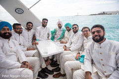 Indian groom with groomsmen at a yacht. Indian groom with groomsmen at a yacht.