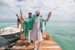 Indian groom and groomsmen on the way to ceremony. Indian groom and groomsmen on the way to ceremony.