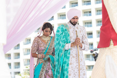 The newlywed couple take seven steps around the holy fire. The newlywed couple take seven steps around the holy fire.