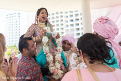 Indian bride putting garland to groom. Indian bride putting garland to groom.