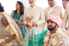 Gorgeous Indian groom during their ceremony celebration. Gorgeous Indian groom during their ceremony celebration.