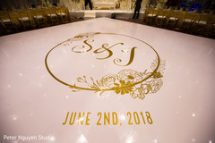 Indian wedding reception monogram on dance floor. Indian wedding reception monogram on dance floor.