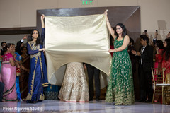Indian newlyweds making their entrance to wedding reception Indian newlyweds making their entrance to wedding reception