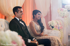 Indian bride and groom at their reception stage. Indian bride and groom at their reception stage.