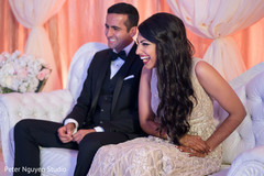 Joyful Indian couple at their reception party. Joyful Indian couple at their reception party.