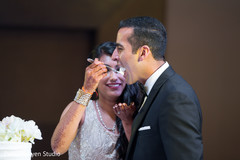 Sweet indian wedding cake cutting moment. Sweet indian wedding cake cutting moment.