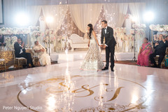 Enchanting indian couple at dance floor. Enchanting indian couple at dance floor.