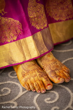 Indian bride showing her mehndi design Indian bride showing her mehndi design