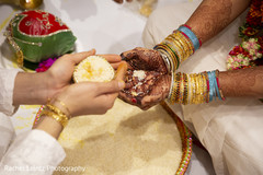 Indian bride and groom during the ceremony Indian bride and groom during the ceremony