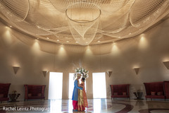 Indian bride and groom posing at the venue Indian bride and groom posing at the venue