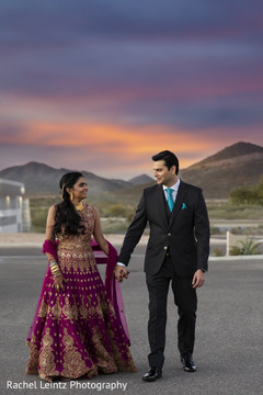 Indian bride and Raja posing outdoors Indian bride and Raja posing outdoors