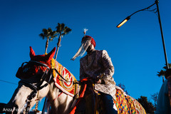 Enchanting Indian groom at his baraat procession. Enchanting Indian groom at his baraat procession.