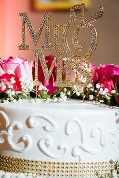 Golden Indian wedding cake topper. Golden Indian wedding cake topper.