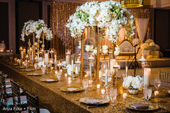 Unique Indian wedding reception table centerpiece. Unique Indian wedding reception table centerpiece.