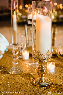 Indian wedding reception table candle decoration. Indian wedding reception table candle decoration.