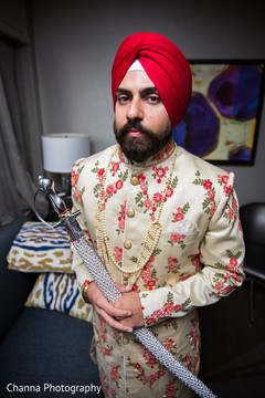 Indian groom holding the kirpan Indian groom holding the kirpan