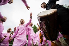 Groomsmen dancing to the dhol Groomsmen dancing to the dhol