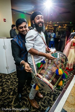 Joyful Sangeet dhol player capture. Joyful Sangeet dhol player capture.
