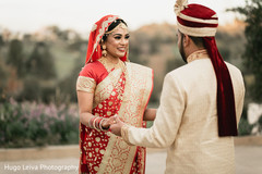 Indian bride and groom outdoors meeting Indian bride and groom outdoors meeting