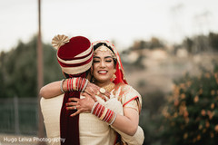 Indian bride and groom having a romantic moment Indian bride and groom having a romantic moment