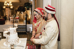 Maharani and Raja cutting the cake Maharani and Raja cutting the cake