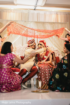 Groom putting the garland on the Maharani Groom putting the garland on the Maharani