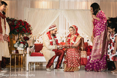 Indian bride and groom during the rituals Indian bride and groom during the rituals