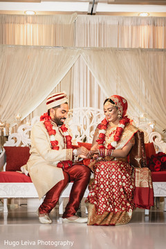 Indian bride and groom having a romantic moment Indian bride and groom having a romantic moment