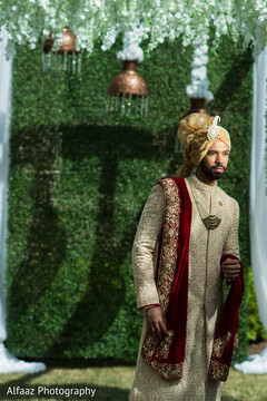 Groom posing with sherwani Groom posing with sherwani