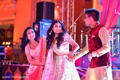 Enchanting Indian bride at a sangeet performance. Enchanting Indian bride at a sangeet performance.